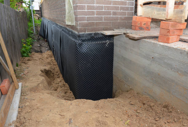 SJ Waterproofing Pros technician performing targeted Waterproofing assessment in South Solon, OH